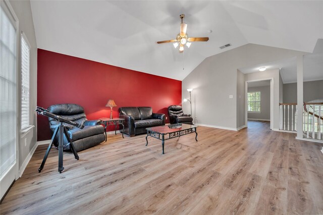 unfurnished bedroom with lofted ceiling, light hardwood / wood-style floors, and ceiling fan