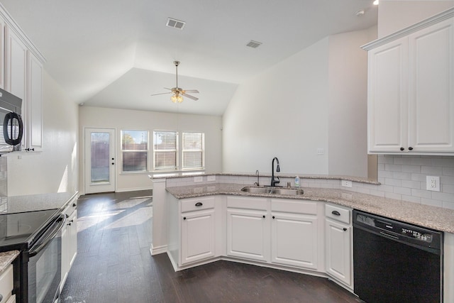 kitchen with white cabinets, sink, lofted ceiling, and black appliances