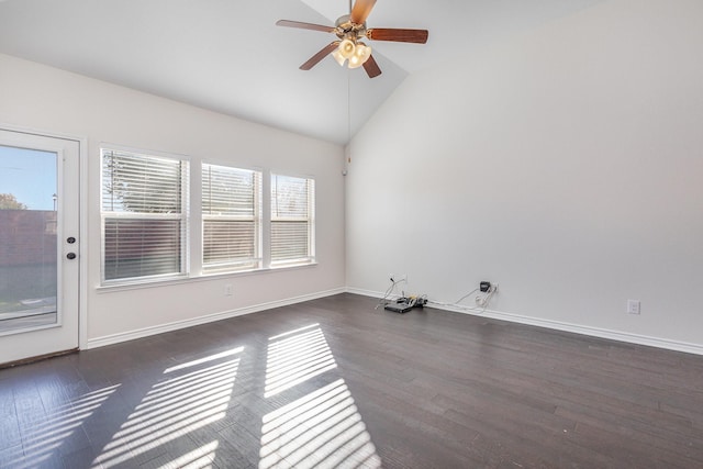 unfurnished room with ceiling fan, dark hardwood / wood-style flooring, and vaulted ceiling