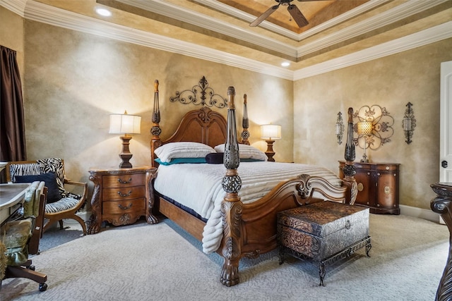 carpeted bedroom with ornamental molding and ceiling fan