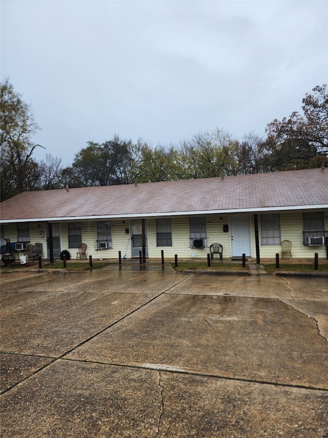 view of front of home with cooling unit