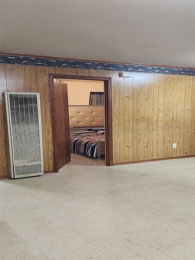 interior space featuring wooden walls