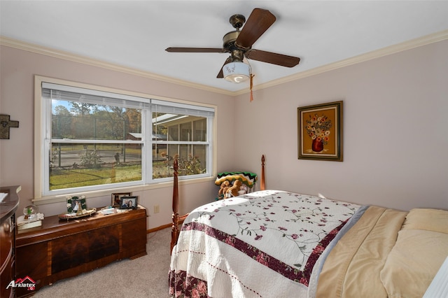 bedroom featuring crown molding, light colored carpet, and ceiling fan