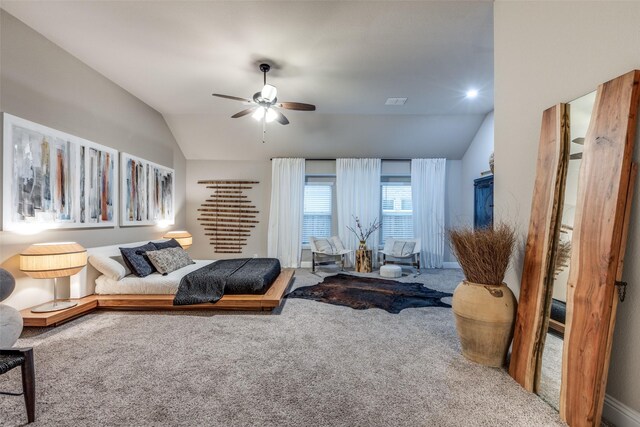 bedroom featuring carpet flooring, ceiling fan, and vaulted ceiling