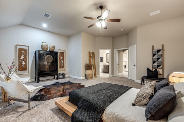 bedroom featuring ceiling fan, carpet floors, and vaulted ceiling