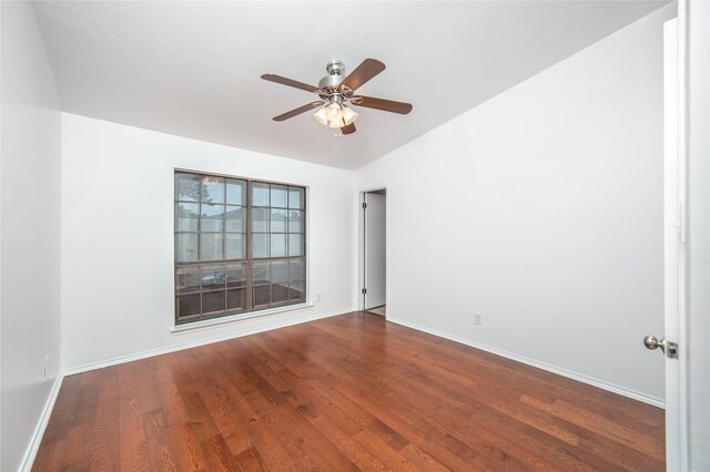 spare room featuring hardwood / wood-style floors and ceiling fan