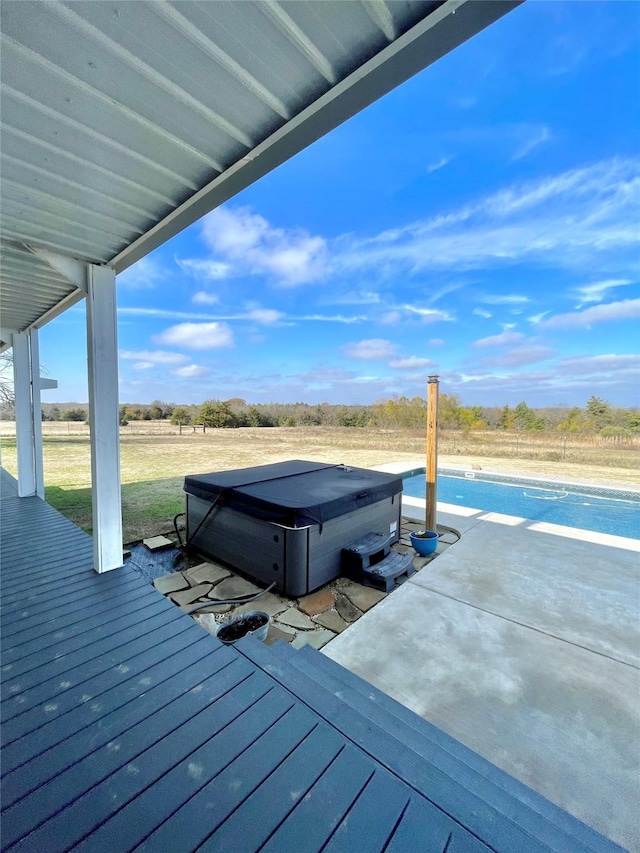 deck with a hot tub