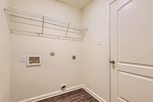 laundry area featuring washer hookup, hardwood / wood-style flooring, hookup for a gas dryer, and electric dryer hookup