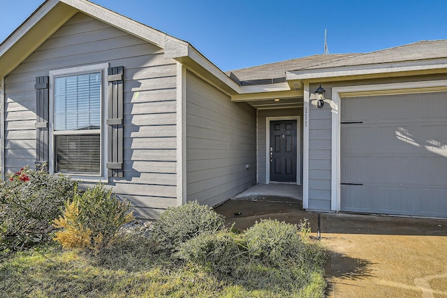 entrance to property with a garage