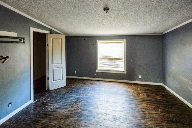 unfurnished bedroom with crown molding, lofted ceiling, dark hardwood / wood-style floors, and a textured ceiling