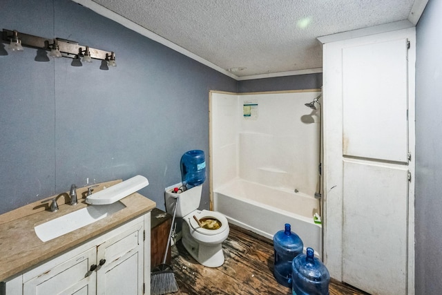 full bathroom with bathing tub / shower combination, vanity, wood-type flooring, a textured ceiling, and toilet