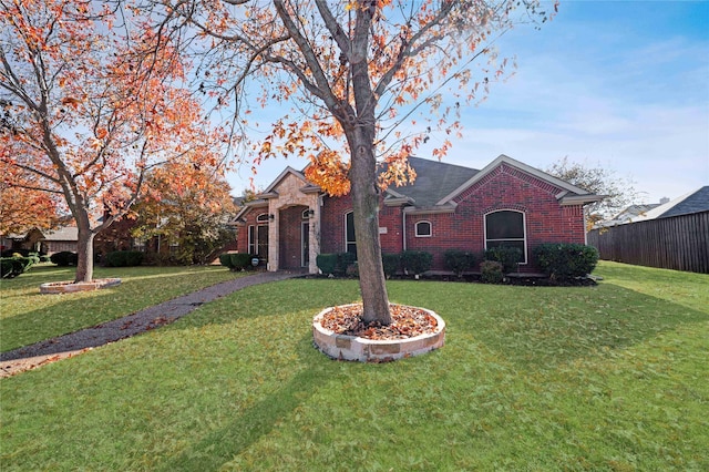 view of front of property with a front lawn