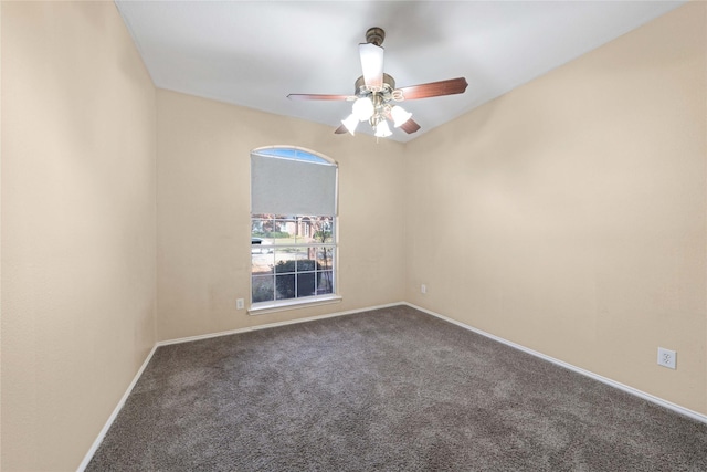 carpeted empty room with ceiling fan