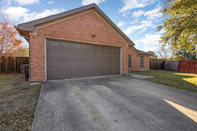 garage with a lawn