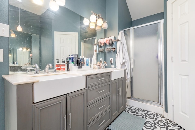 bathroom with vanity and walk in shower