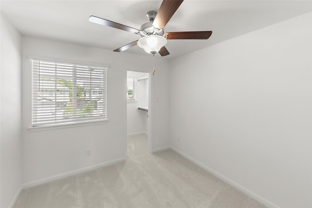 225 Griffith Dr, Princeton, TX 75407 - unfurnished room featuring ceiling fan, light colored carpet, plenty of natural light, and baseboards