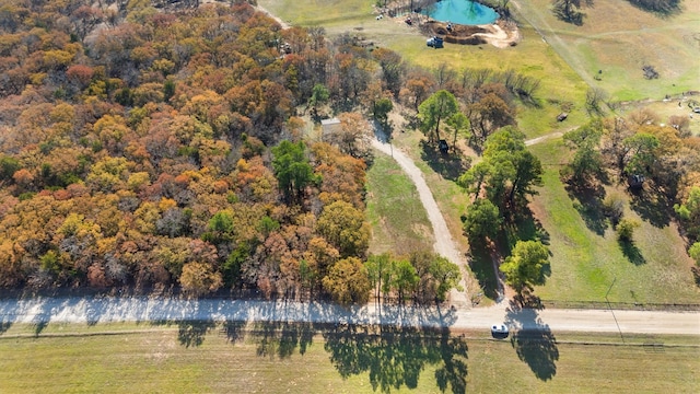 birds eye view of property featuring a rural view