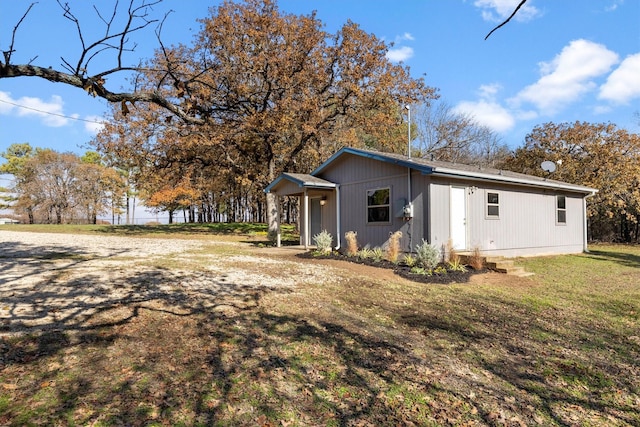 exterior space with a lawn