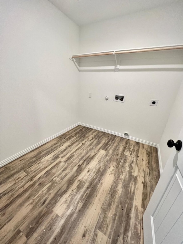 washroom featuring hookup for an electric dryer, hookup for a washing machine, gas dryer hookup, and hardwood / wood-style flooring