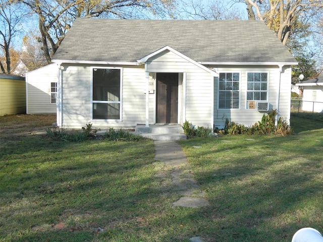 view of front of home featuring a front lawn