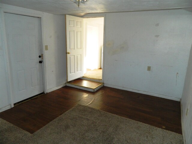 entryway featuring dark wood-type flooring