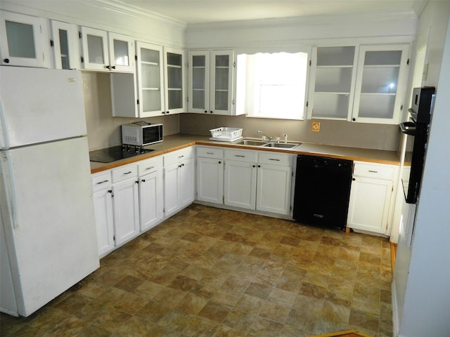 kitchen featuring sink, white cabinetry, ornamental molding, and black appliances