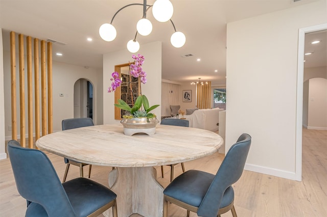 dining area featuring light hardwood / wood-style floors