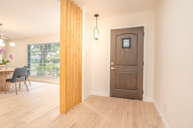 foyer entrance featuring light wood-type flooring