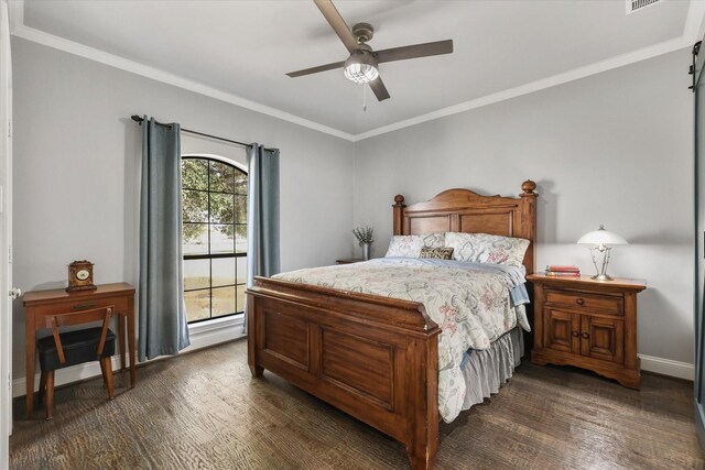 bedroom featuring ceiling fan, ornamental molding, and dark wood-type flooring