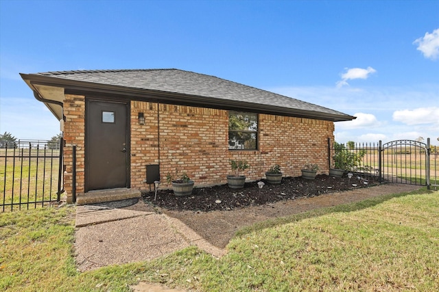 view of property exterior with a lawn