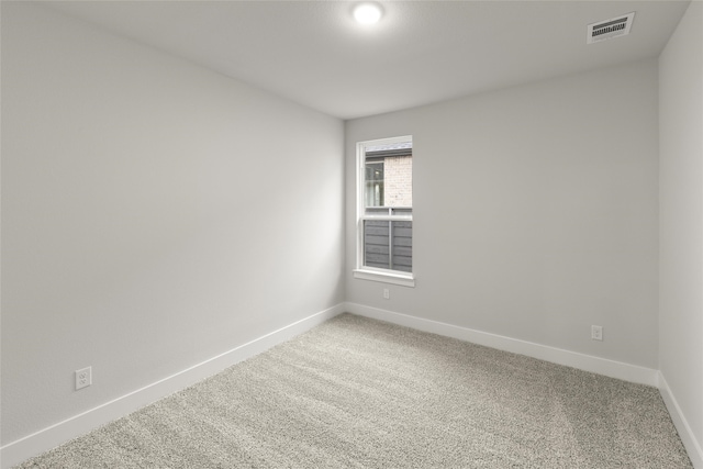 unfurnished room with carpet floors