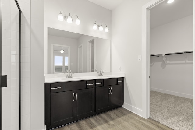 bathroom with vanity and hardwood / wood-style floors