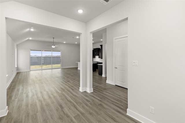 unfurnished living room with hardwood / wood-style flooring and ceiling fan