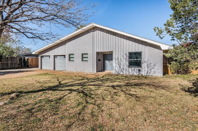 garage with a lawn