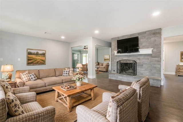 living room with a fireplace and hardwood / wood-style floors
