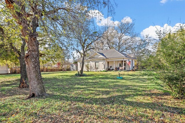 view of yard featuring a porch