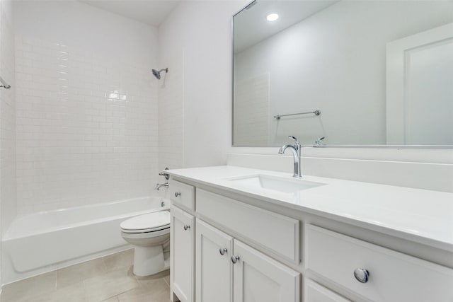 bathroom featuring recessed lighting, toilet, washtub / shower combination, vanity, and tile patterned floors