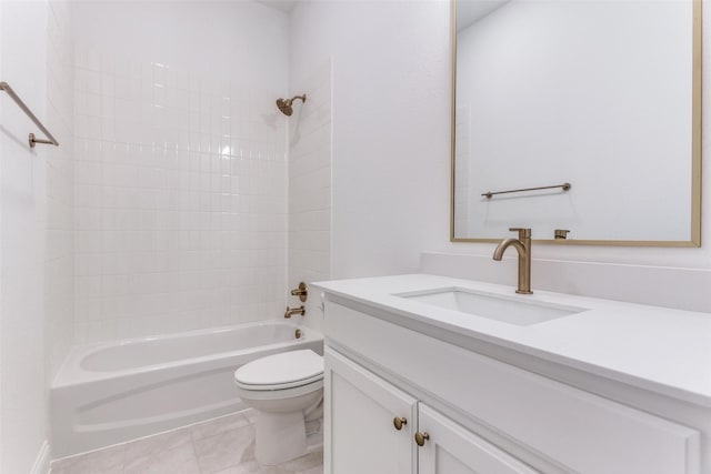 full bathroom featuring vanity, bathtub / shower combination, toilet, and tile patterned floors