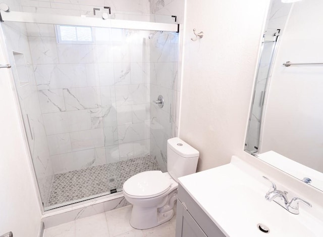 bathroom with walk in shower, vanity, and toilet