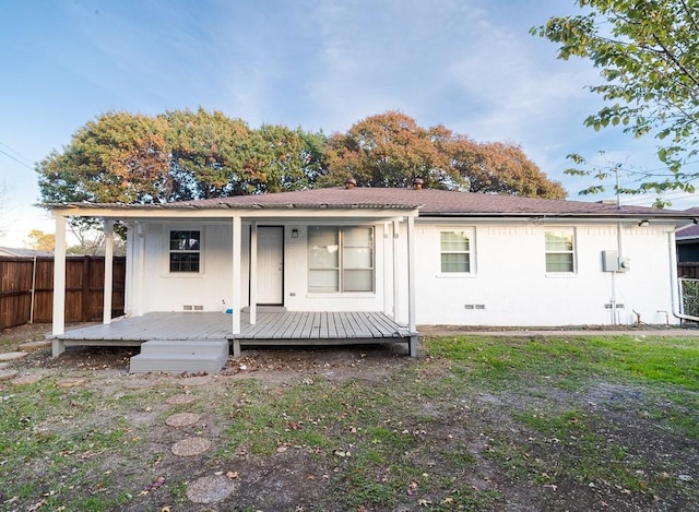 back of house featuring a deck