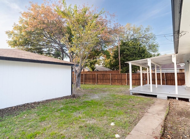 view of yard with a deck