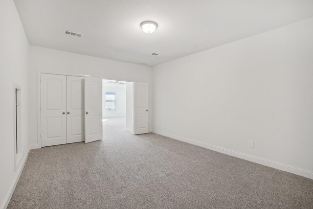 interior space with ceiling fan