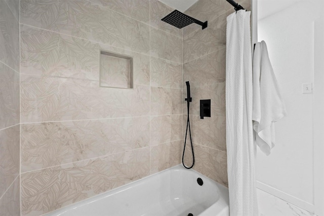 bathroom featuring shower / tub combo with curtain