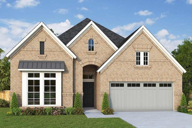 view of front of home featuring a front lawn and a garage