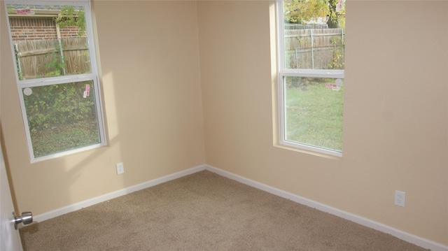 view of carpeted spare room