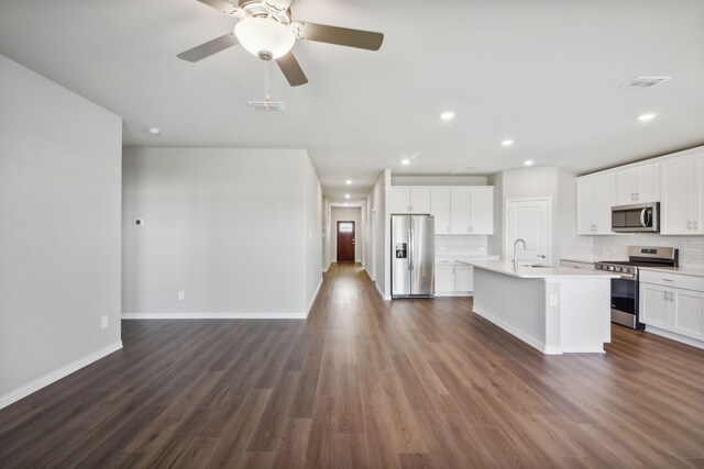 carpeted office with vaulted ceiling