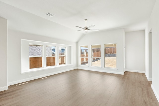 interior space with ceiling fan, light wood-type flooring, and lofted ceiling