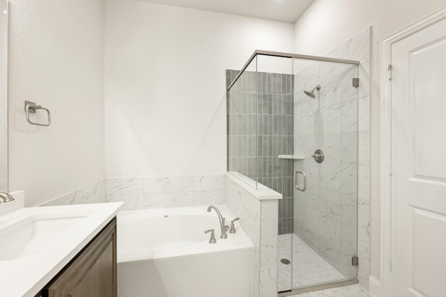 bathroom with separate shower and tub and vanity