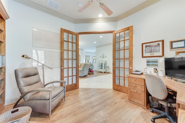 office area with french doors, ceiling fan, crown molding, and light wood-type flooring