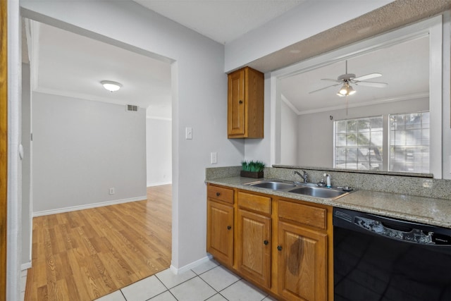 kitchen featuring crown molding, sink, ceiling fan, black dishwasher, and light hardwood / wood-style floors